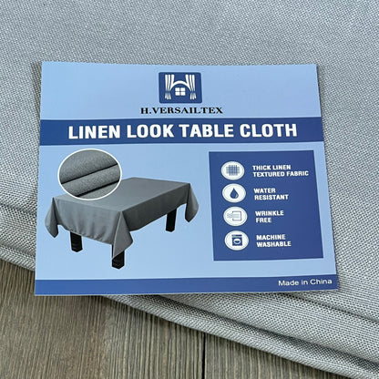 H.VERSAILTEX grey linen textured tablecloth, 60x104 inch, wrinkle-free, waterproof, shown with packaging and fabric detail.