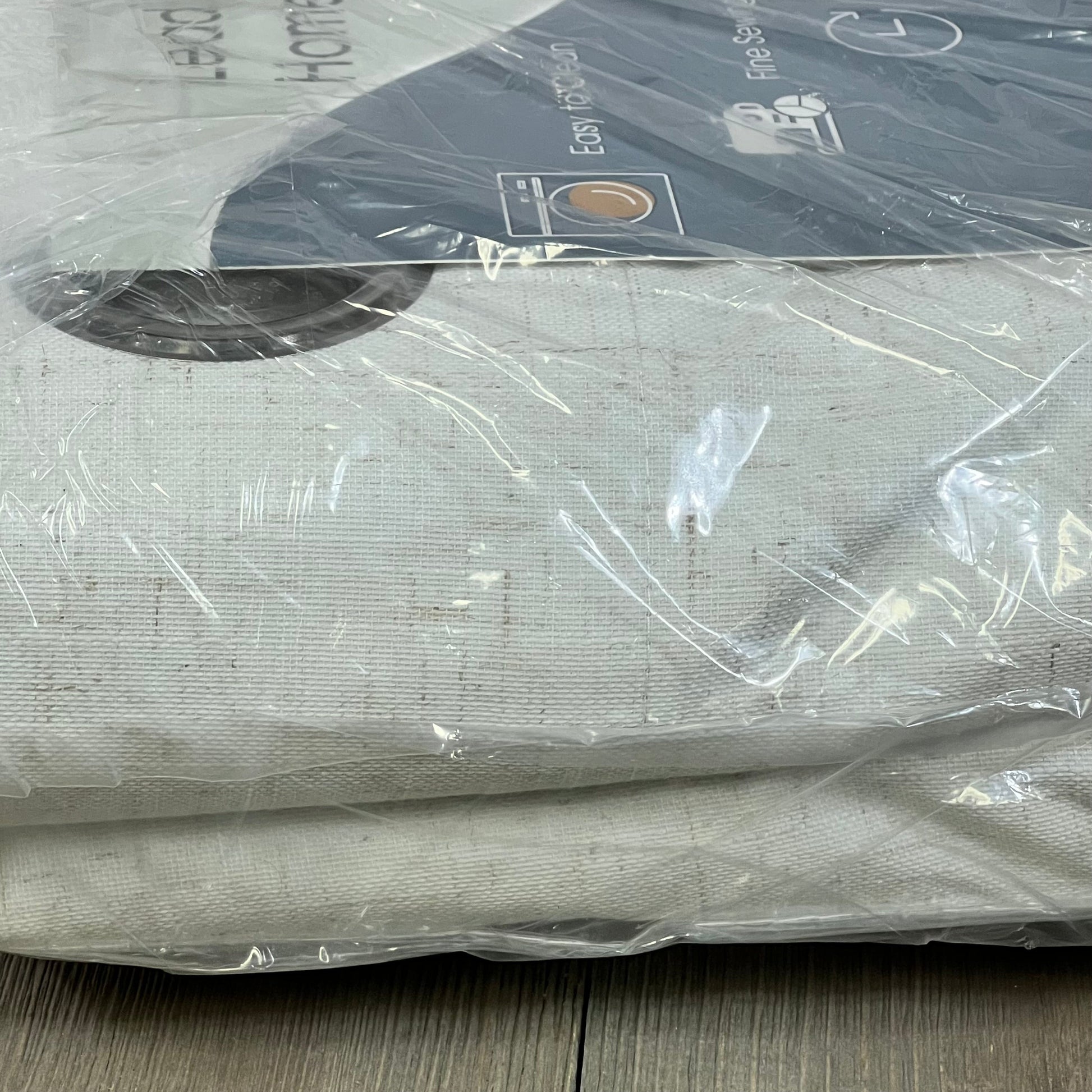 Cream Linen Blackout Curtains in packaging, showcasing natural beige color and thermal insulation for room darkening.