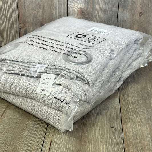 Grey linen curtains in plastic packaging, showcasing light grey burlap texture for farmhouse decor, 52x95 inches each panel.