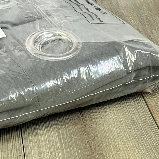 Joydeco extra long dark grey blackout curtains in packaging, featuring grommet tops for easy installation, 108 inches long.