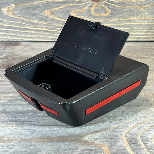 Hidden storage box for Kia Sportage 2023-2025, open lid showing spacious interior for center console organization.