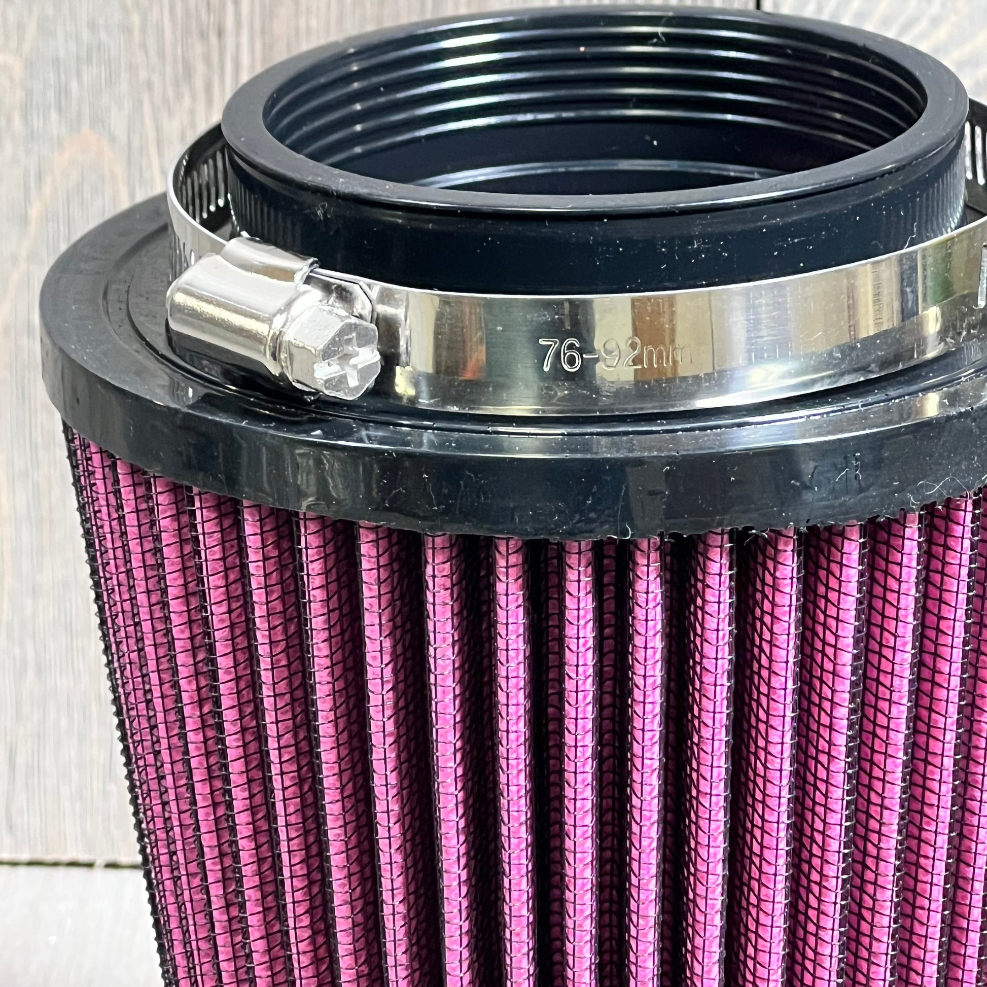 High-performance engine air filter kit for Yamaha YFM700 Raptor, featuring a silver intake and holder adapter.