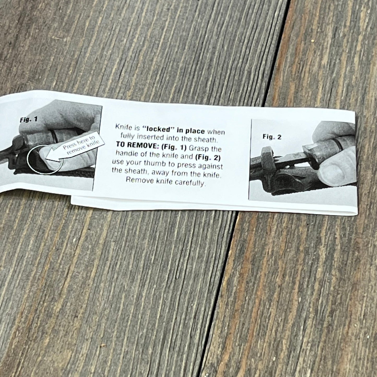 Instructions for using the Ka-Bar Kydex Sheath, demonstrating the safe removal of a knife from its secure lock.
