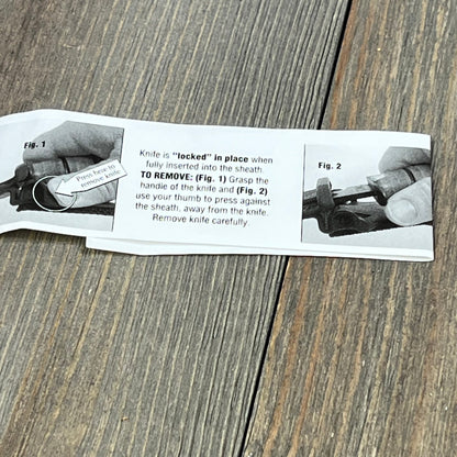 Instructions for using the Ka-Bar Kydex Sheath, demonstrating the safe removal of a knife from its secure lock.