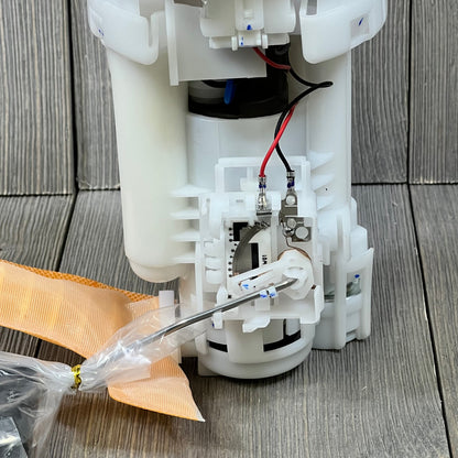 Electric fuel pump module assembly for Toyota Corolla 1.8L, 2004-2007, part number 77020-02190, close-up view.
