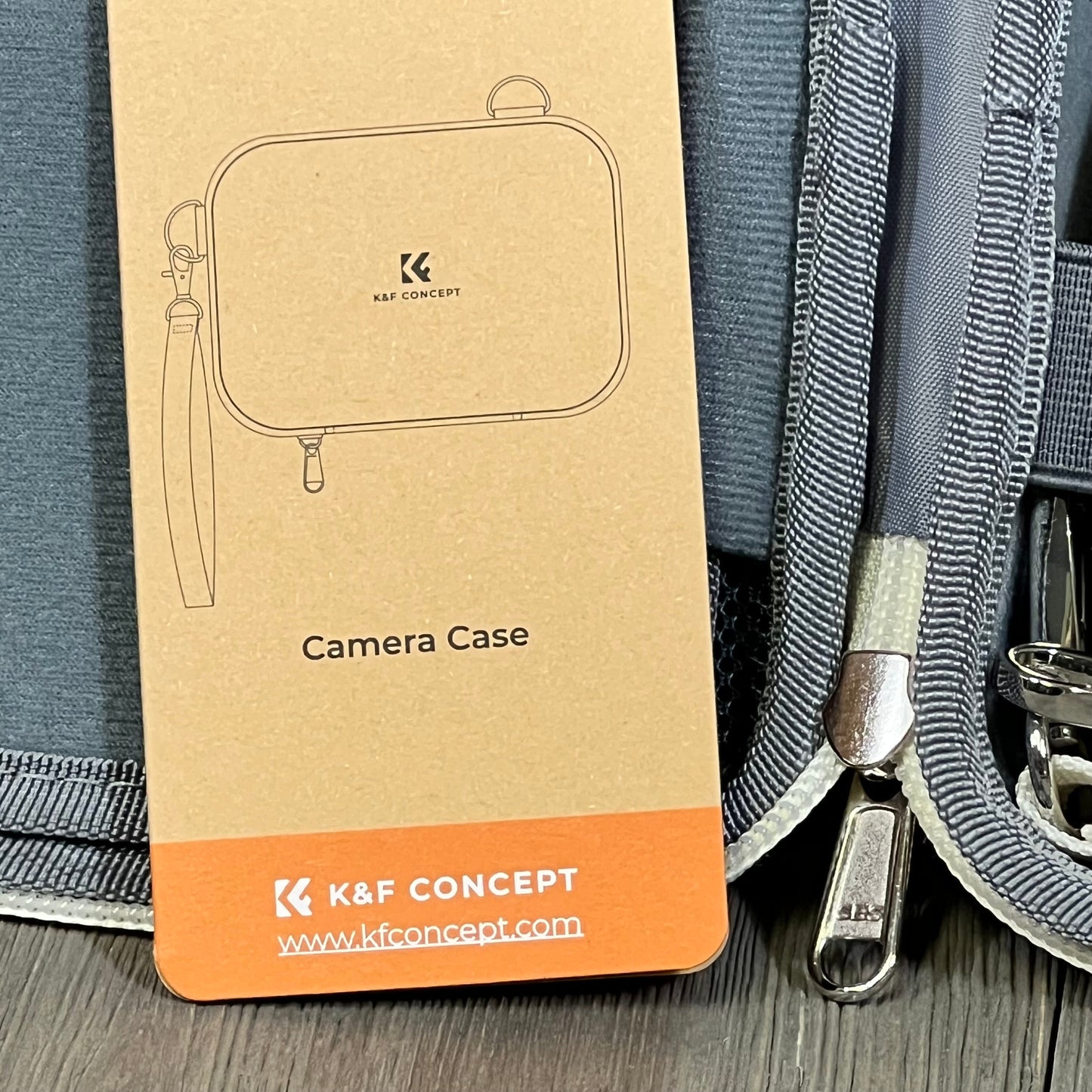 Beige K&F Concept waterproof camera case with dual carry options, showcased with packaging.