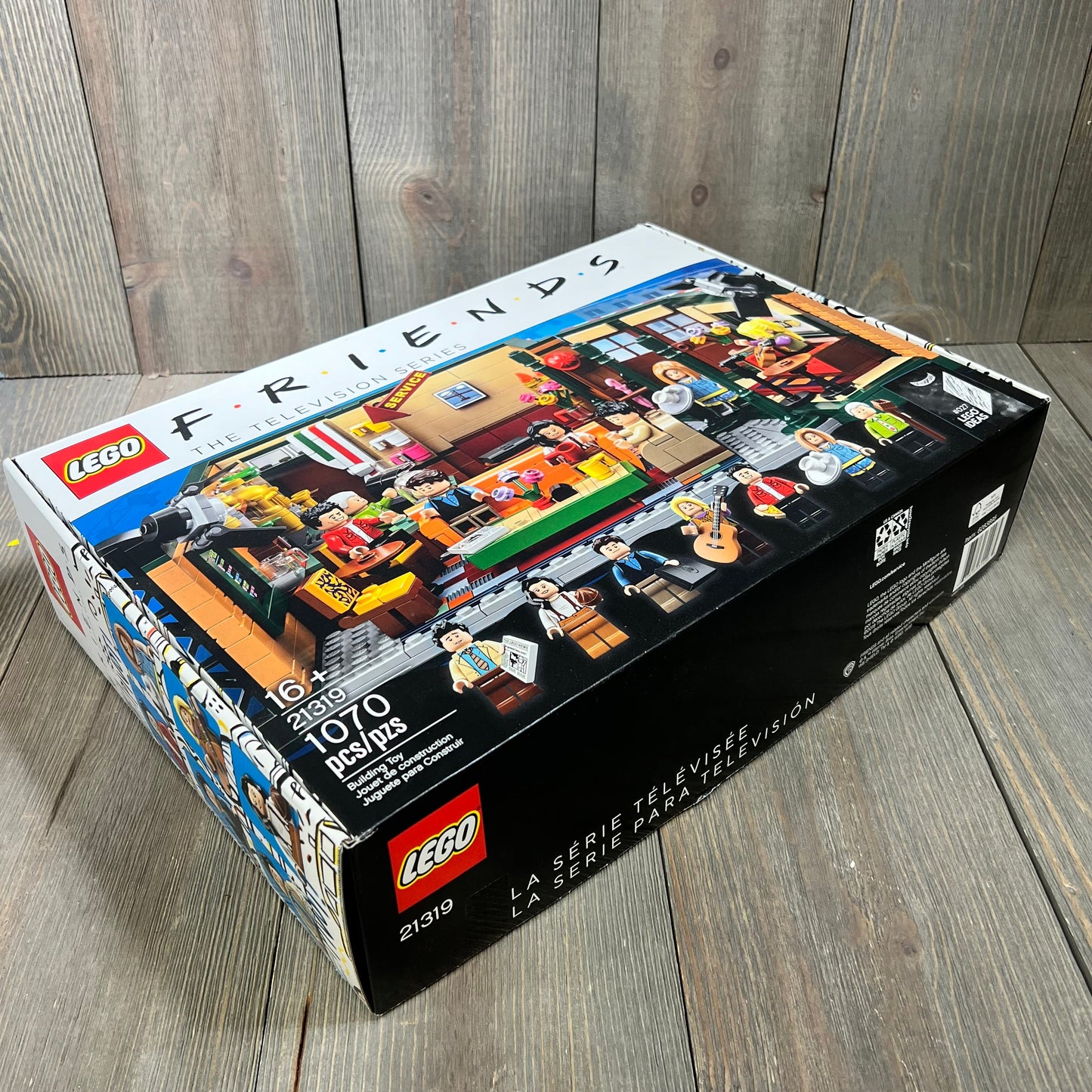 Friends Lego Box featuring iconic Central Perk scene with minifigures, detailed set design, and vibrant packaging.