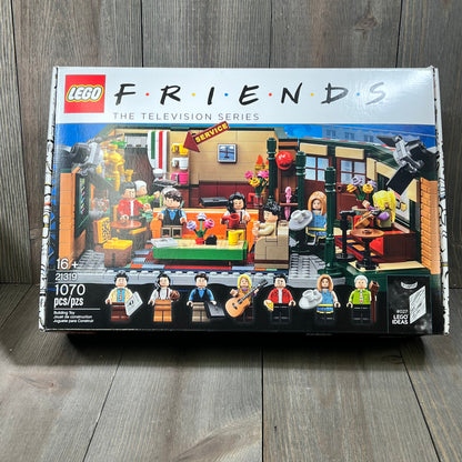 Friends Lego Box featuring detailed Central Perk set, iconic TV show characters as minifigures, perfect for fans and collectors.