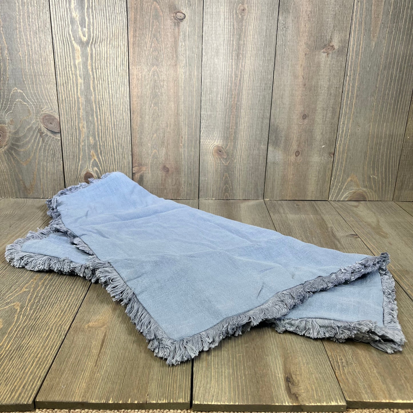 Light blue linen pillow covers with fringe and tassels, perfect for boho farmhouse decor. Set of 2, ideal for couches or beds.