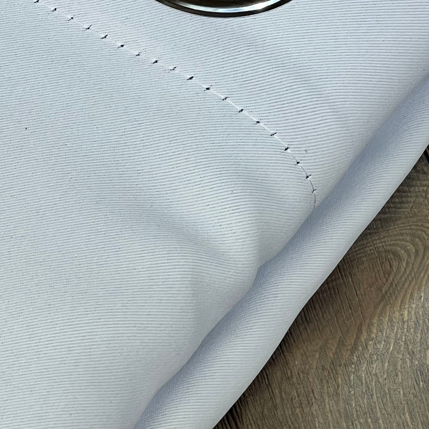 Greyish white RYB HOME curtain fabric detail showing texture and stitching, ideal for noise reduction and insulation.