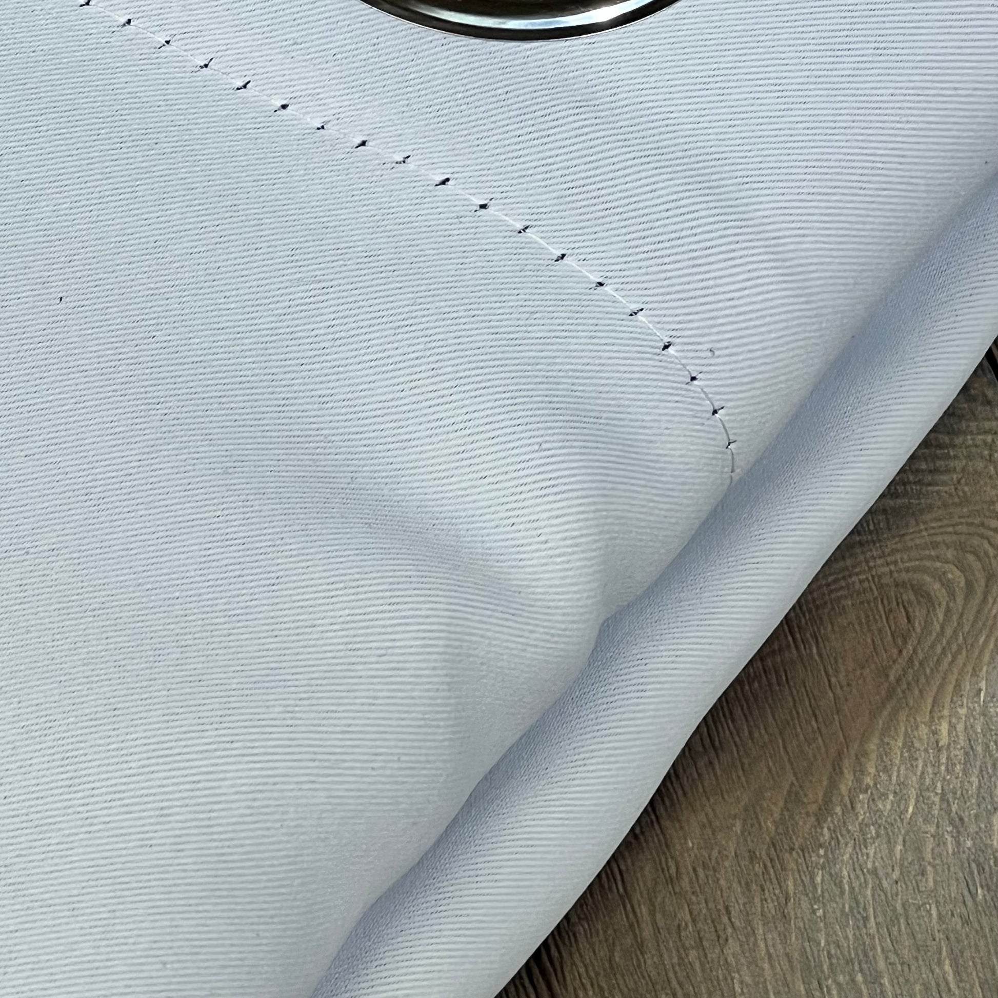 Greyish white RYB HOME curtain fabric detail showing texture and stitching, ideal for noise reduction and insulation.