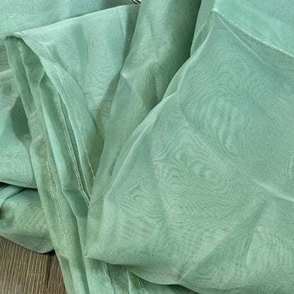 Sage green NICETOWN sheer curtains with textured voile fabric, perfect for farmhouse living room or bedroom decor.