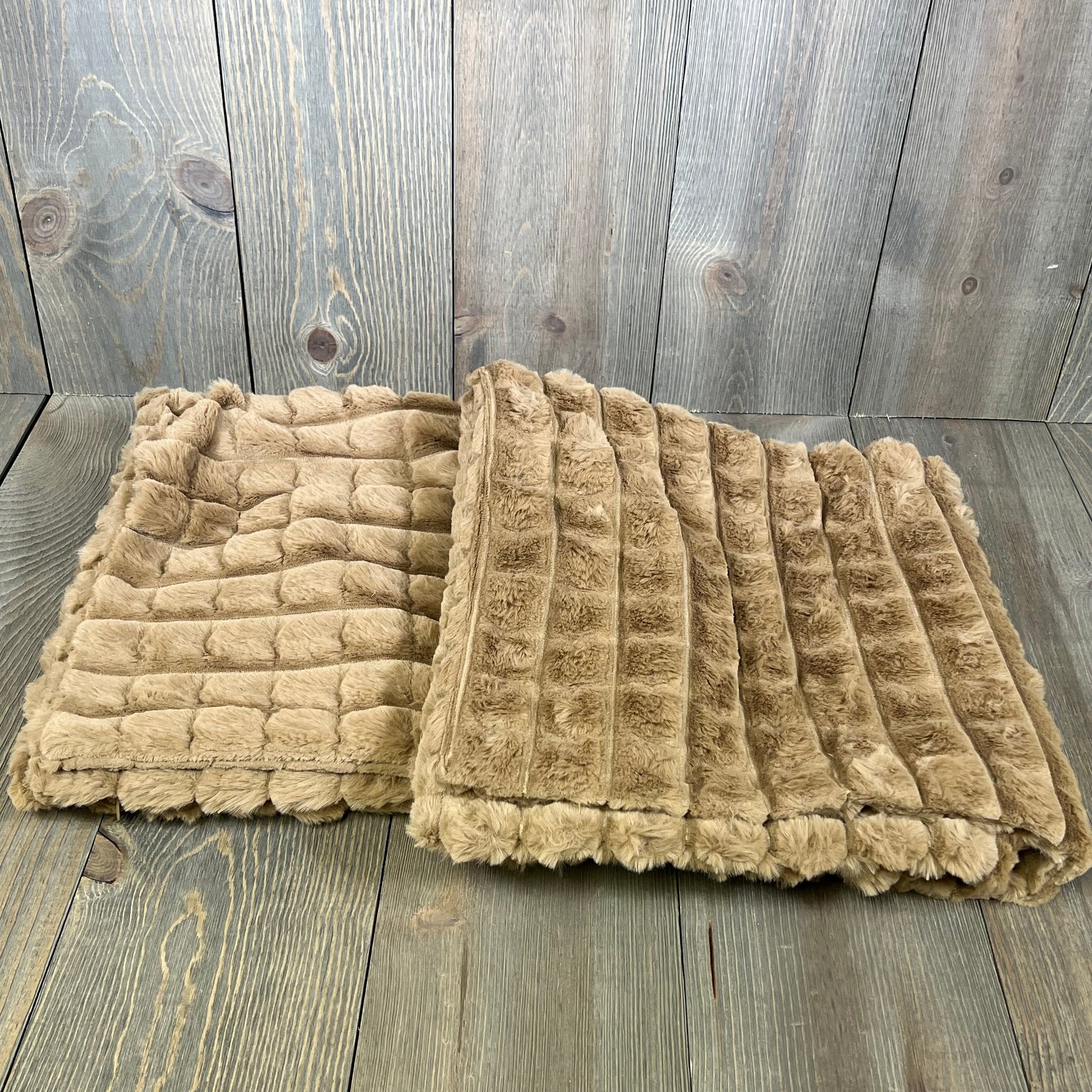 Brown faux fur pillow covers with plaid texture, 26x26 inches, perfect for modern luxury home decor on sofas and beds.