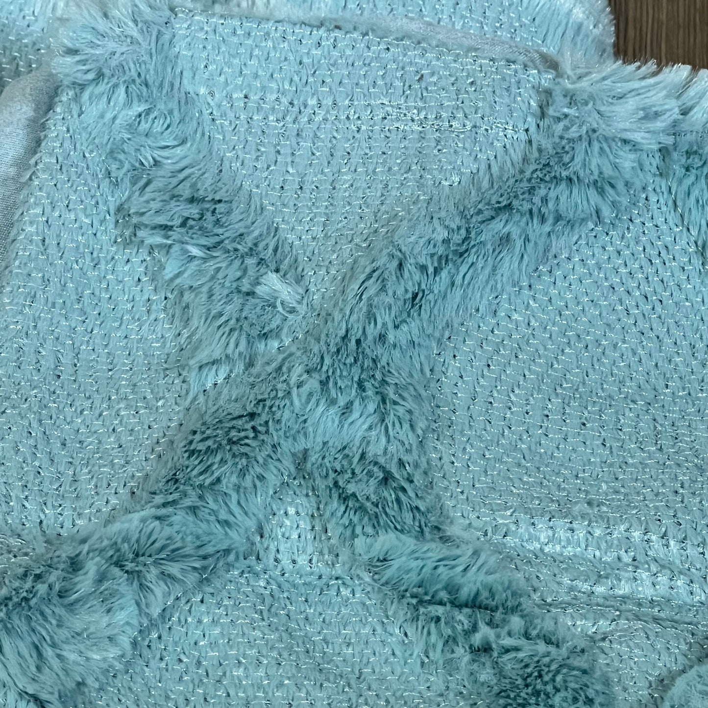 Sky blue throw pillow cover with soft plush faux wool texture, perfect for farmhouse decor on couch or bed.