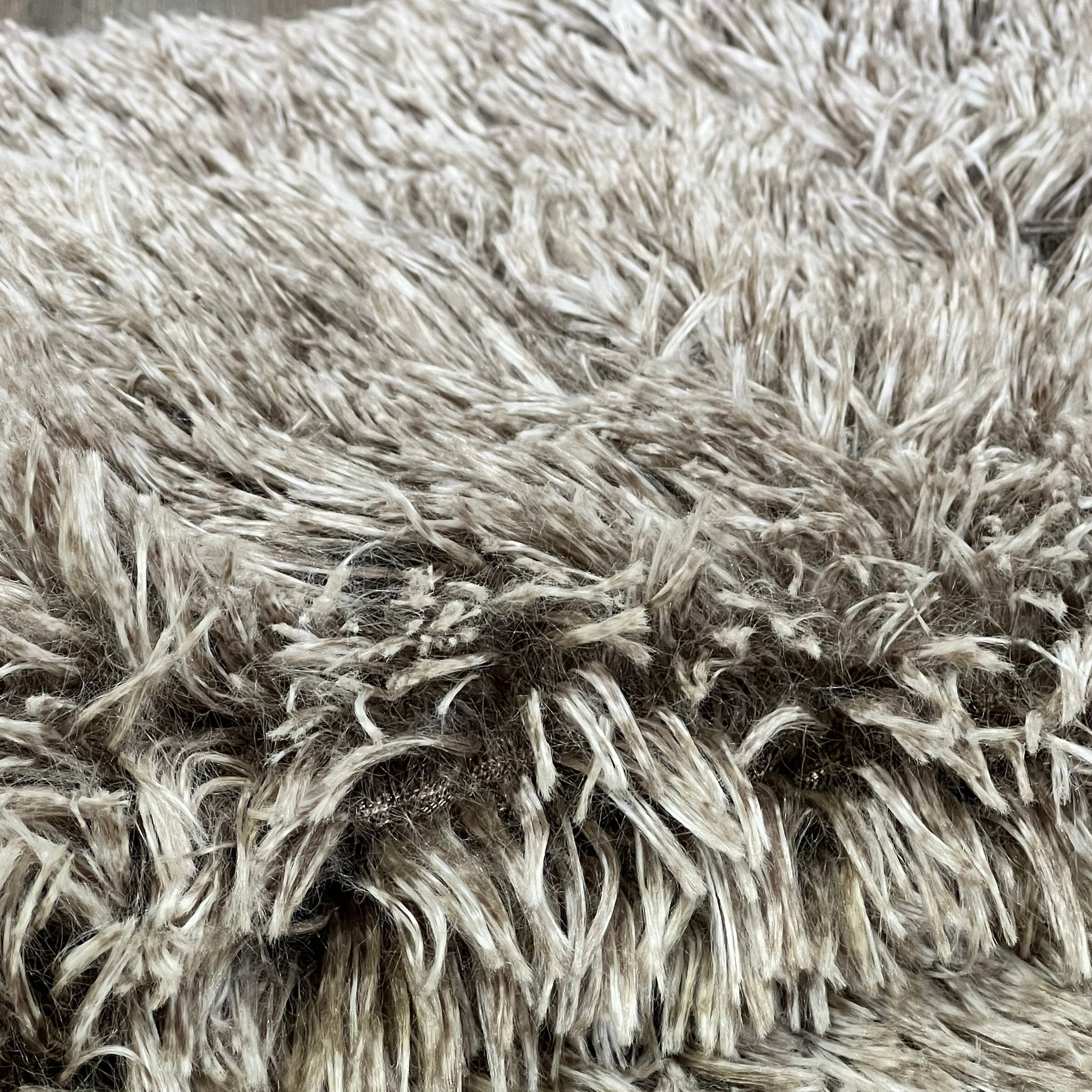Shaggy ombre khaki faux fur pillow sham, showcasing luxurious texture and softness, perfect for home decor.