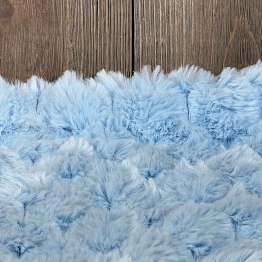 Light blue plush faux fur texture of MANDIOO decorative throw pillow cover, 18x18 inches, perfect for sofa or bed decor.