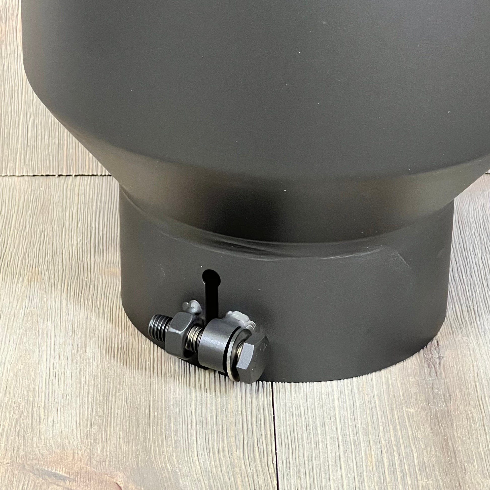 Black powder-coated exhaust tip with a 5" inlet and 8" outlet, showcasing a durable bolt-on design.