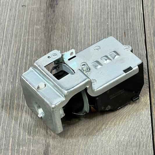 Durable headlight switch for Dodge Ram 1500/2500/3500 1998, showcasing robust metal construction on wooden background.
