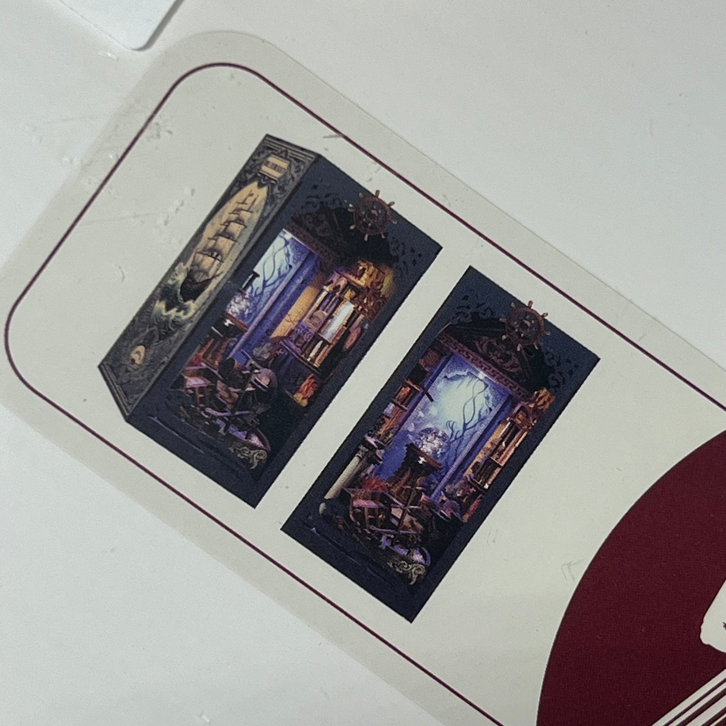 Miniature Seabed Riddle book nook kit showcasing intricate underwater decor with LED light and bookshelf scene.