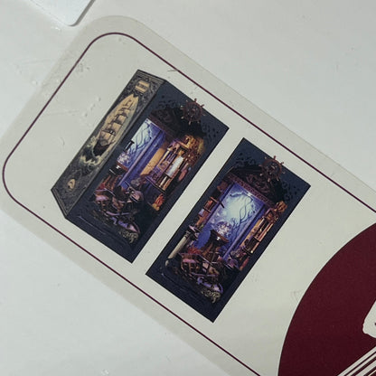 Miniature Seabed Riddle book nook kit showcasing intricate underwater decor with LED light and bookshelf scene.