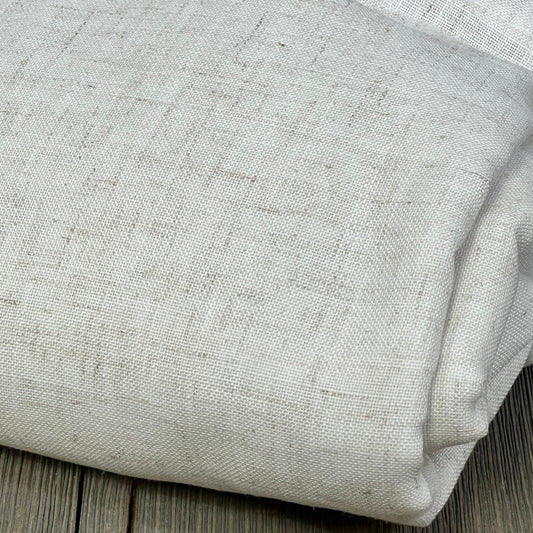 Ivory linen curtains close-up showing texture, ideal for living room. Semi-sheer, 105 inches long, farmhouse style.