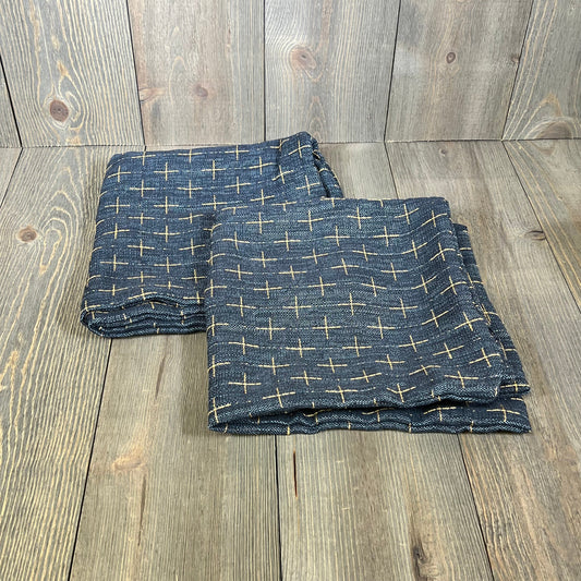 Rustic blue burlap linen pillow covers with woven texture, perfect for modern farmhouse decor in sofas and beds.
