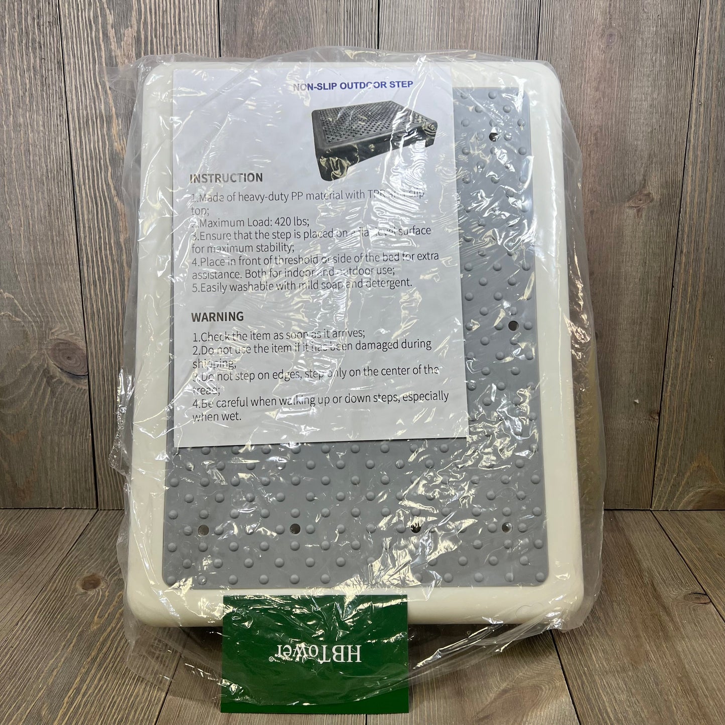 Non-slip white HBTower step stool with safety instructions, ideal for adults and seniors, in protective packaging.