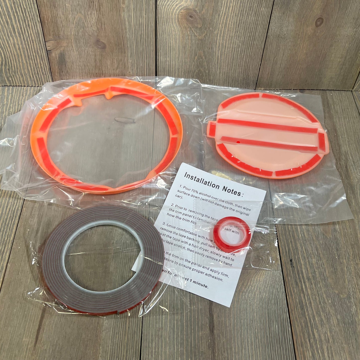 Orange Savadicar fuel door trim kit with installation notes and adhesive for Jeep Wrangler JL JLU 4xe & Gladiator JT.