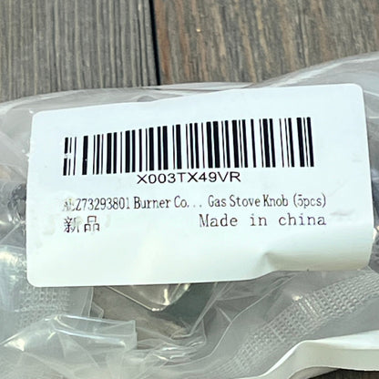 Replacement LG stove knobs labeled AEZ73293801, packaged in a clear bag with barcode visible, made in China.