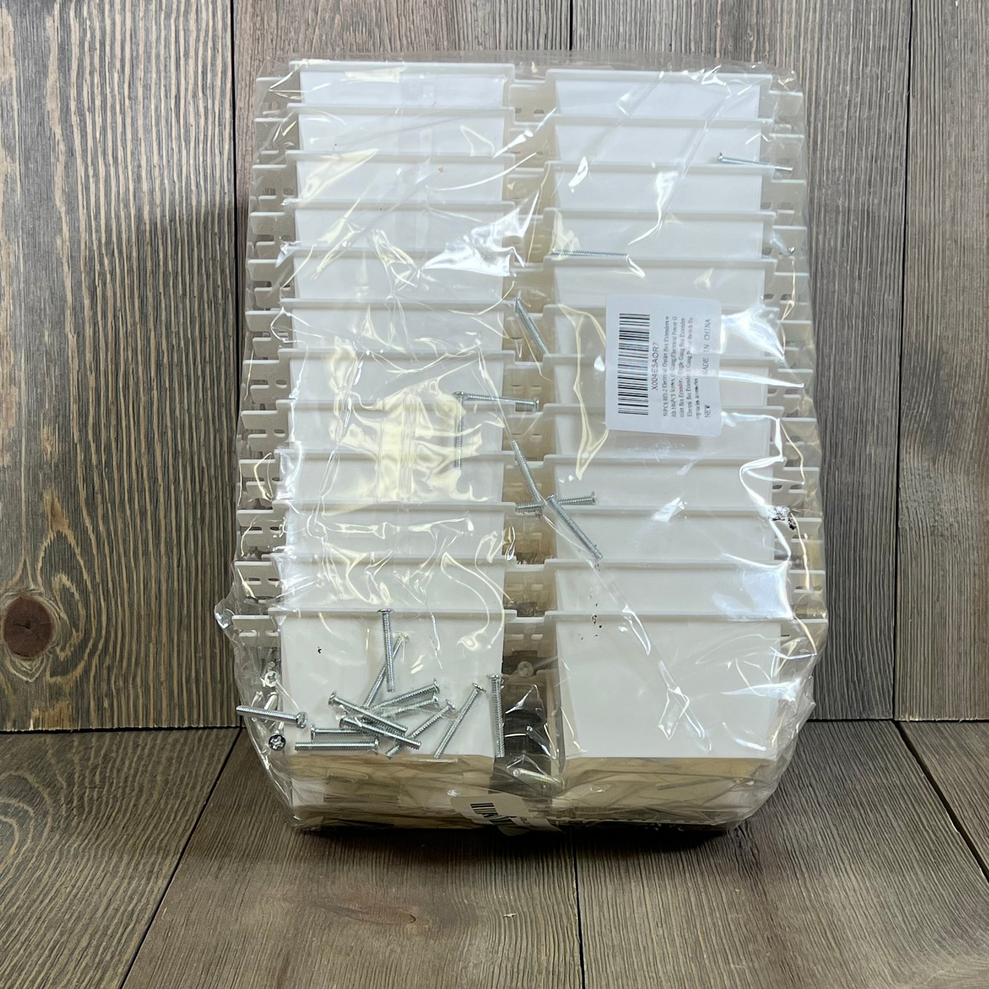 50PCS BE1-2 electrical outlet box extenders with 100 screws in packaging for single gang power switch installation.