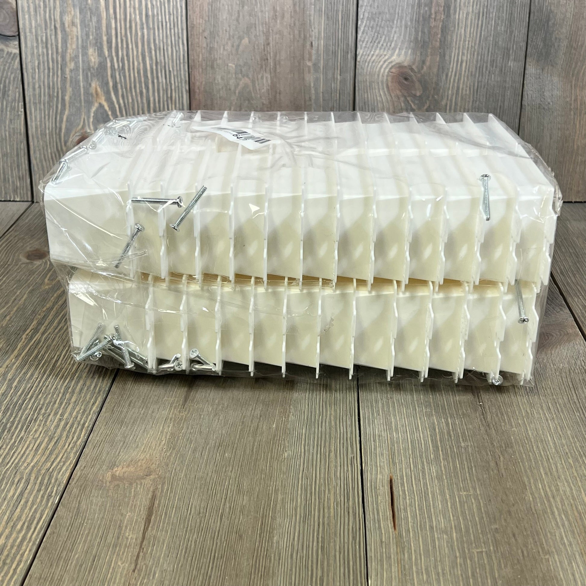 50PCS electrical outlet box extenders with 100PCS screws, single gang, packaged on a wooden surface.