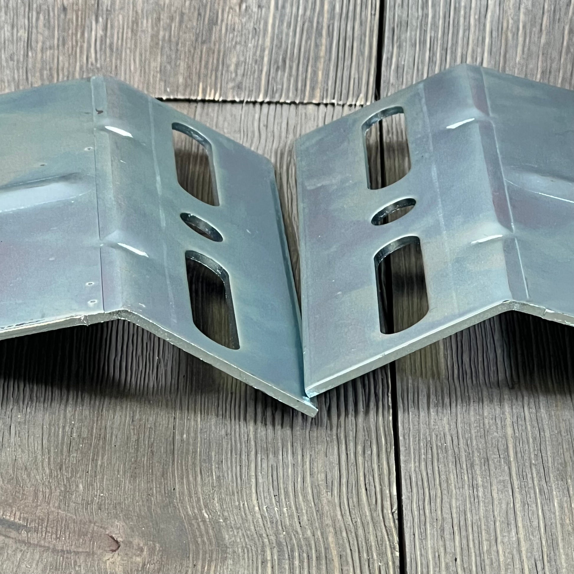 Sturdy 15" garage door plunger bumpers for opener systems, featuring durable metal construction and precise design.