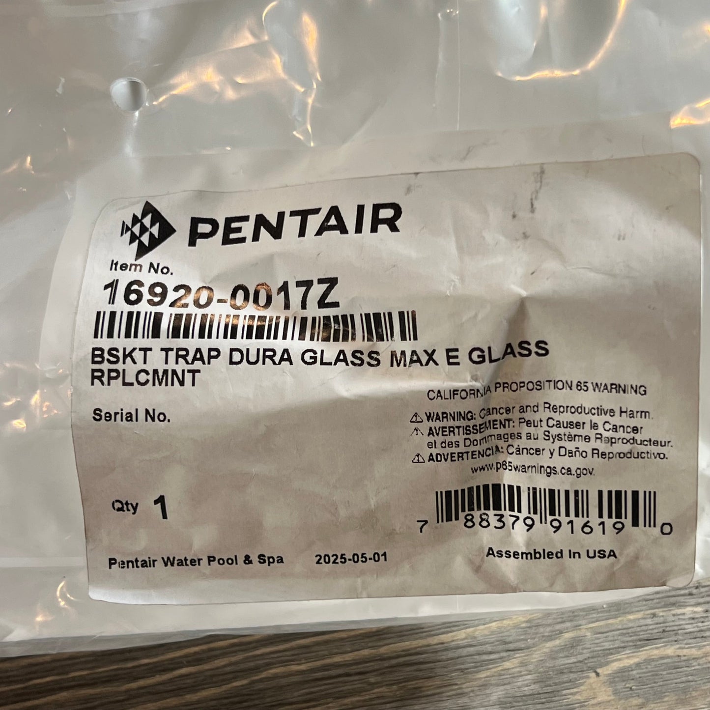 Pentair strainer basket label with model number 16920-0017Z, showing replacement details and safety warnings.