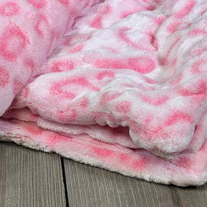 Pink leopard print pillow cover in soft flannel fleece, ideal for couches and beds, size 20x20 inches, set of 2.