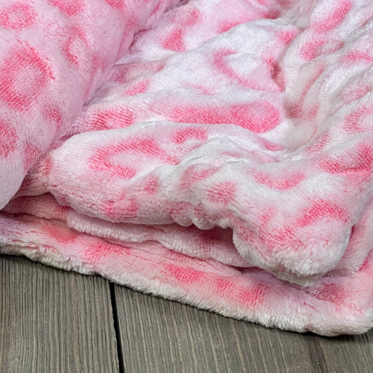 Pink leopard print pillow cover in soft flannel fleece, ideal for couches and beds, size 20x20 inches, set of 2.