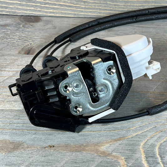 Power door lock actuator for 13-19 Hyundai Santa Fe, front right, showing metal latch and cable connections.