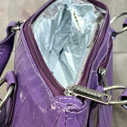 Purple Primeware wine clutch bag showing thermal insulation interior for optimal wine temperature control.