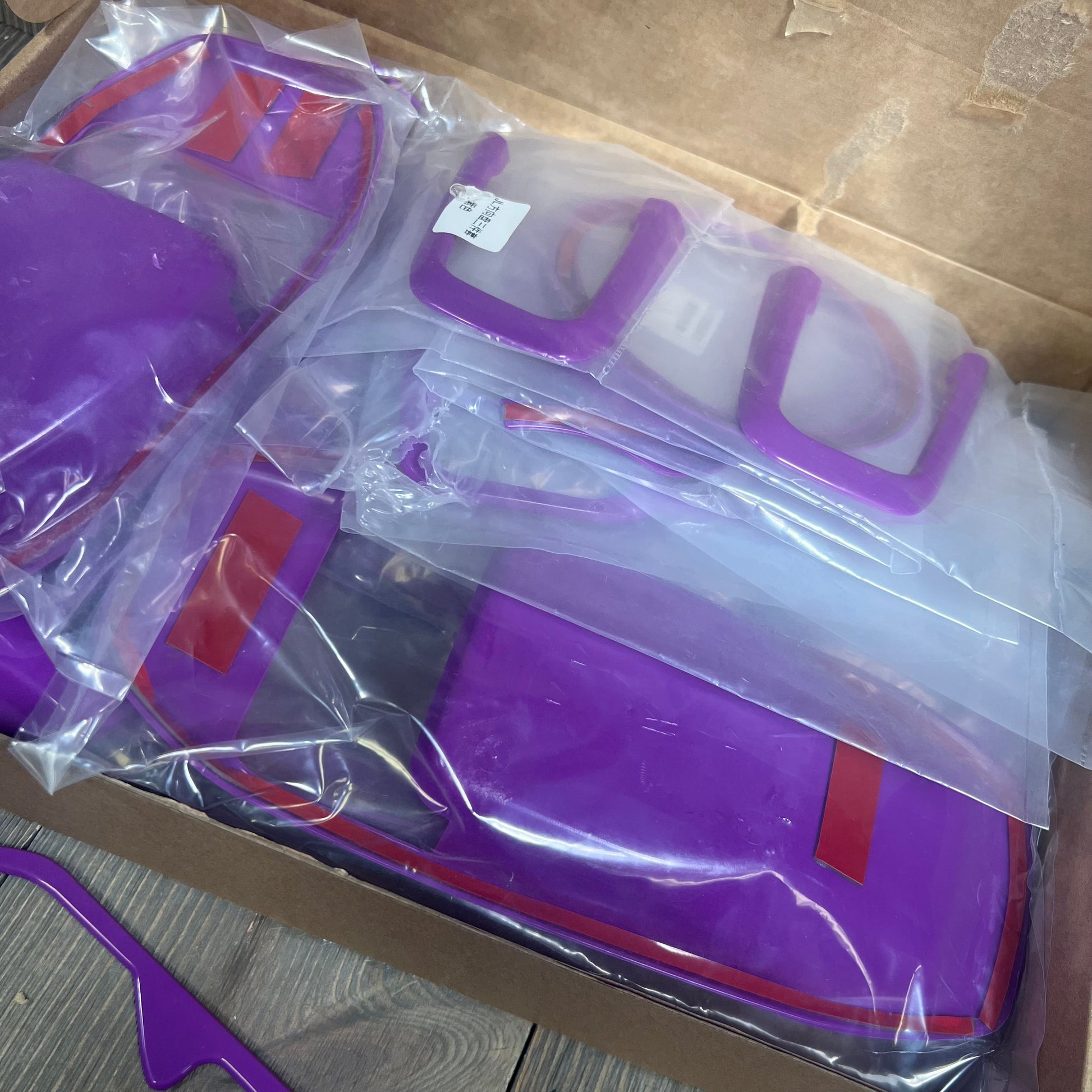 Purple interior trim kit for Jeep Wrangler JL JLU Gladiator JT 2018-2023, including steering wheel and door handle covers.