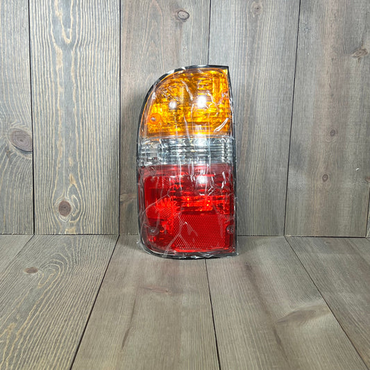 Toyota Tacoma rear brake light replacement for 2001-2004 models. Left driver side tail light lamp with turn signal.