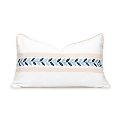 Coastal lumbar pillow cover, 12"x20", features a tan embroidered leaf pattern with piping, perfect for patio or indoor decor.