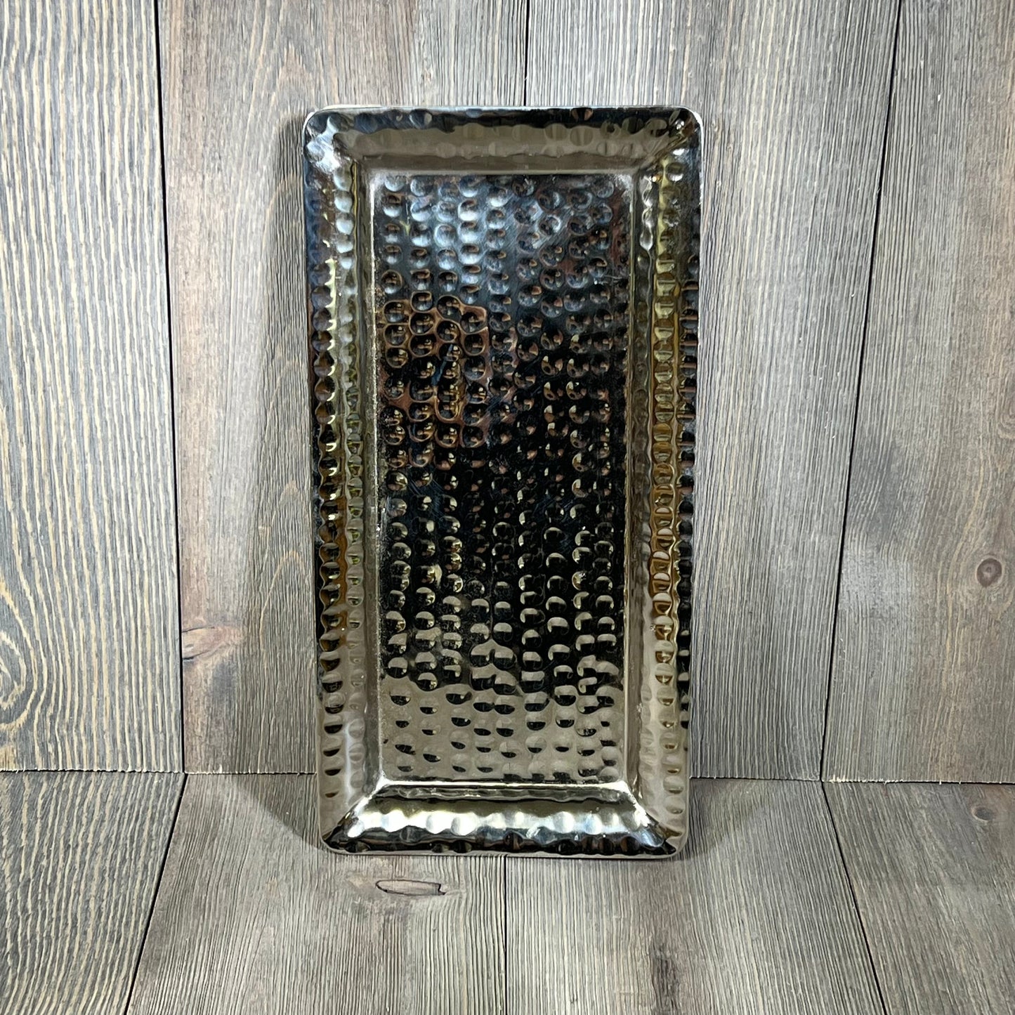 Hand hammered nickel finish serving tray, 12-inch rectangle platter for parties, desserts, and fruits on wooden background.