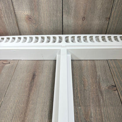 Refrigerator crisper drawer cover frame with vented design, compatible with Frigidaire models, shown on wooden surface.