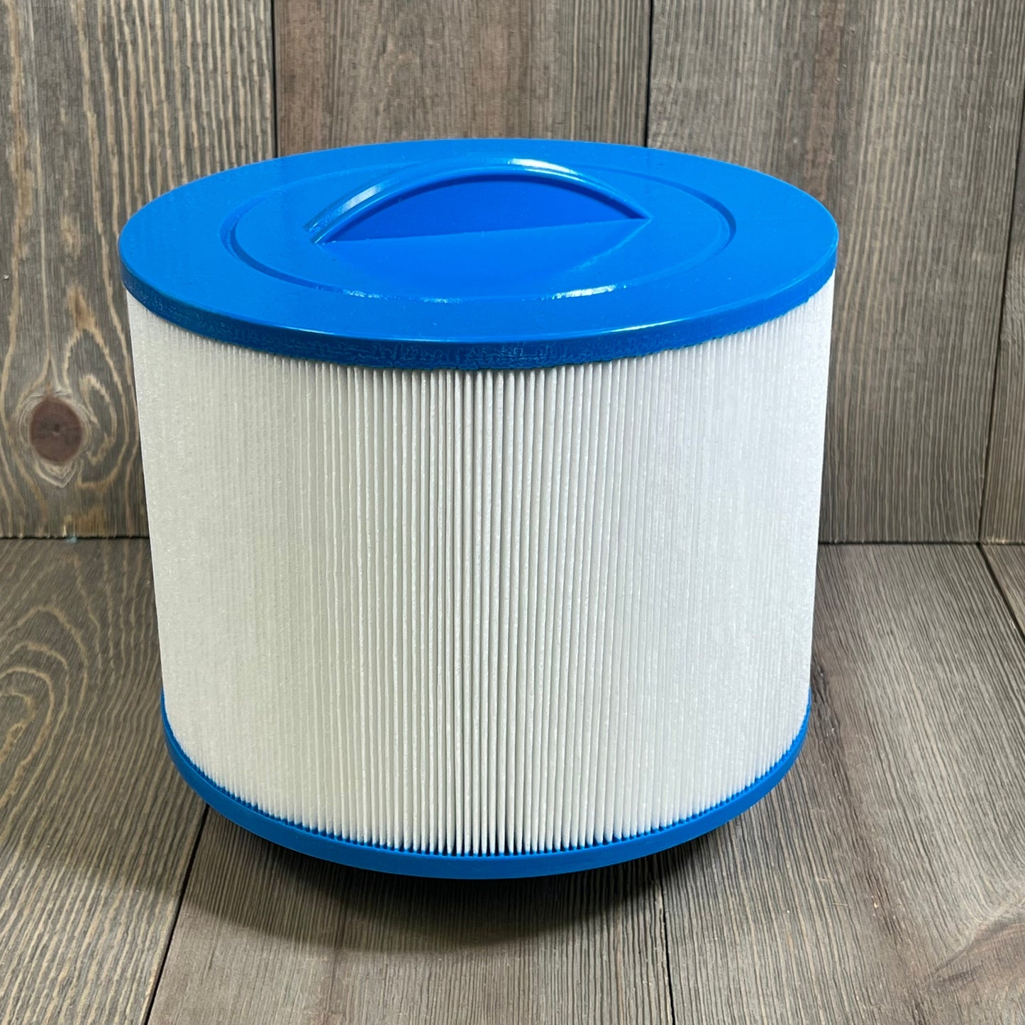 Blue-capped 1047345716-8CH-950 spa filter cartridge with pleated design for PBF35, PBF50-F2S, Bullfrog spa models.