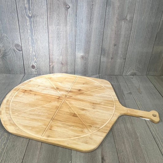 Lightweight 18” bamboo pizza peel with slice grooves, ideal for outdoor ovens and cutting board use.