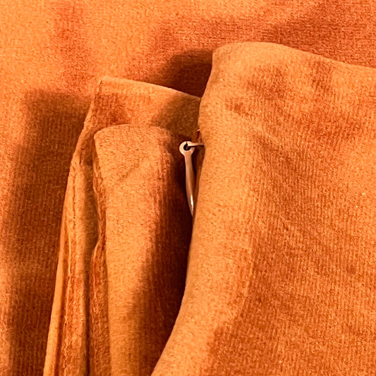 Burnt orange velvet throw pillow covers with zipper detail, perfect for enhancing couch and bed decor, 16x16 inches.