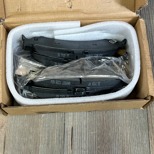 Rear ceramic brake pads by ECCPP in box, ideal for Cadillac, Chevrolet, GMC. Premium disc brake pad set, ATD834C compatible.