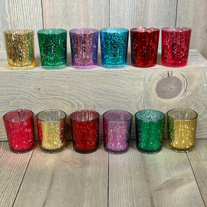 Assorted jewel-tone mercury glass votive candle holders in rich colors, set of 12, ideal for elegant decor.