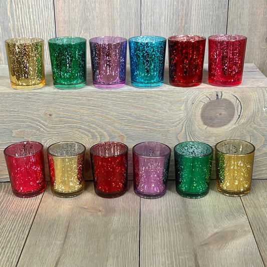 Assorted jewel-tone mercury glass votive candle holders in rich colors, set of 12, ideal for elegant decor.