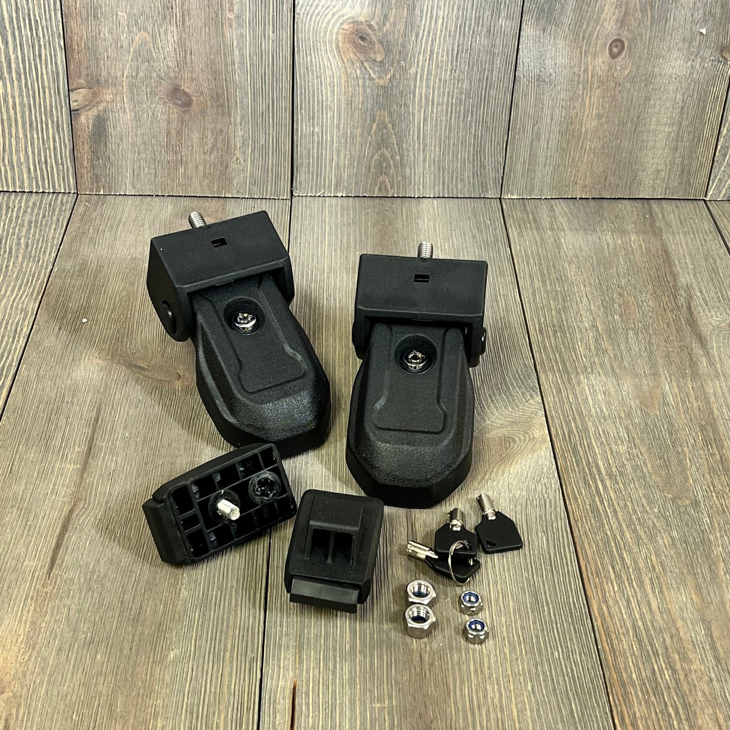 Black OEM hood latches with keys for Jeep Wrangler JL JLU Gladiator 2018-2024, enhancing security and style.