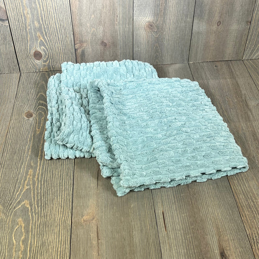 Soft corduroy throw pillow covers in dusty green, boho striped design, perfect for farmhouse decor on couch or bed.